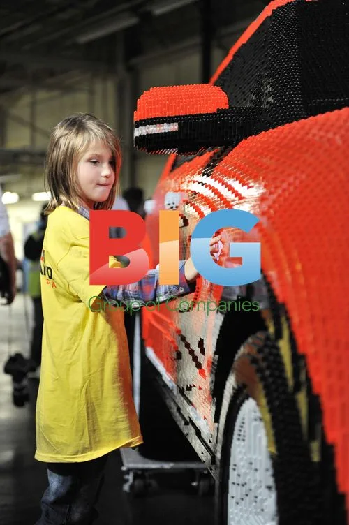 Karina Snoddy inspects LEGO Ford Explorer