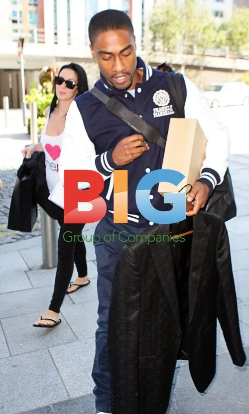 Maria Kouka and Simon Webbe leaving hotel