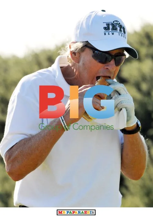 Michael Douglas Plays Golf and Eats Hotdog