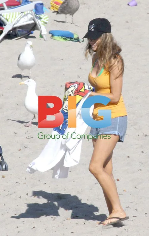 Denise Richards Enjoys Beach Day with Family