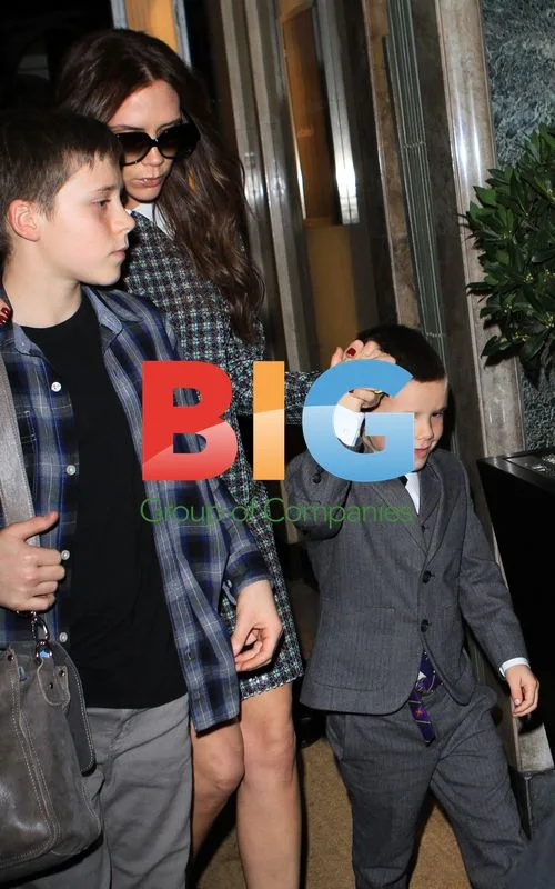 Victoria Beckham and Family Leave Hotel
