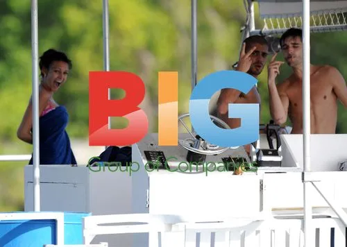 The Wanted members swim with turtles in Barbados