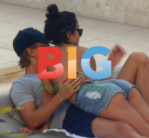 Vanessa Hudgens and Austin Butler Poolside