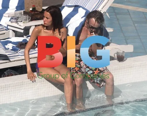 Tom Felton & Girlfriend Pool Day