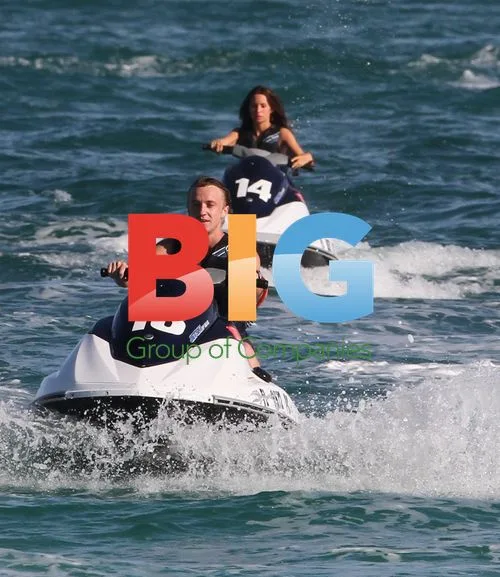 Tom Felton on jet skis with girlfriend in Miami