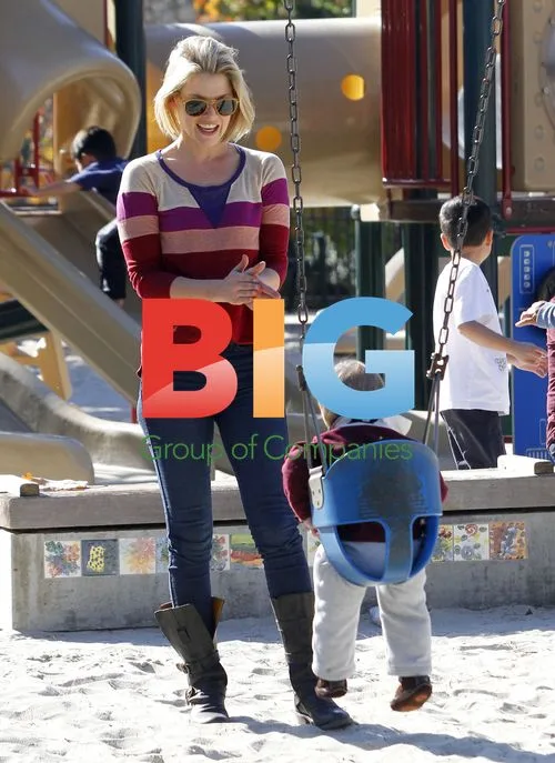 Ali Larter and son at park