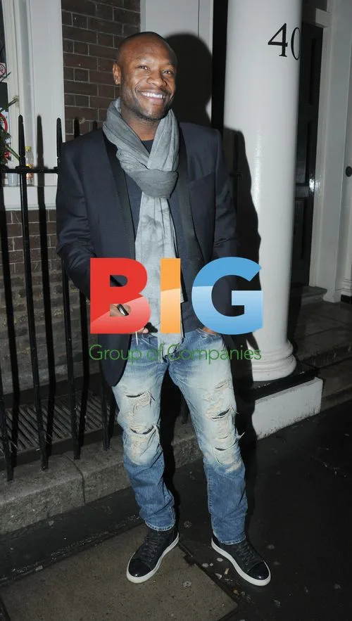 Injured Tottenham footballer William Gallas out in London