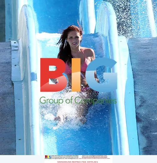 Amy Childs in Pink Bikini on Waterslide