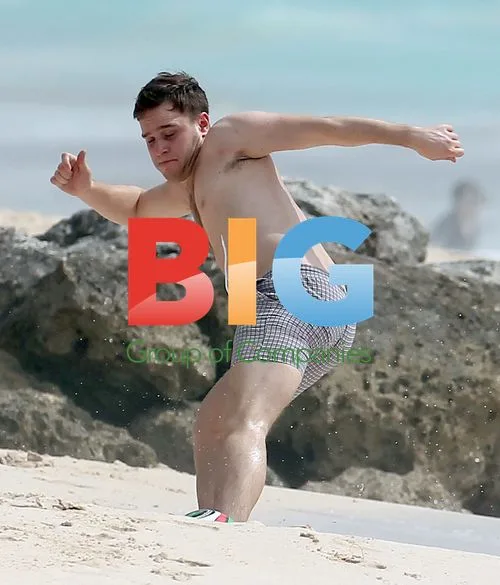Olly Murs Playing Football on Caribbean Beach