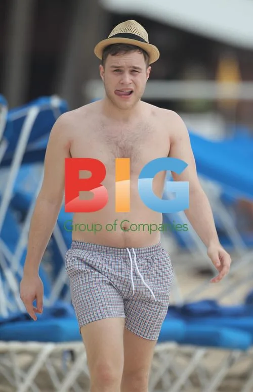 Olly Murs plays football on Caribbean beach