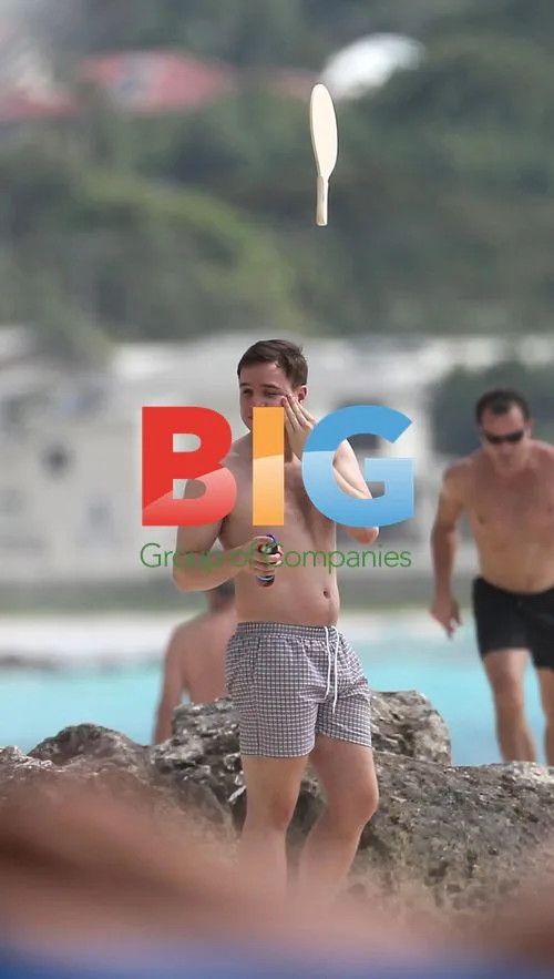 Olly Murs Playing Football on Beach