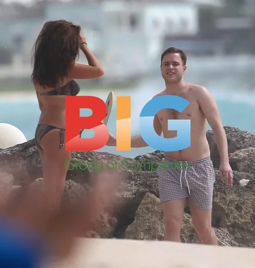 Olly Murs Playing Football on Beach