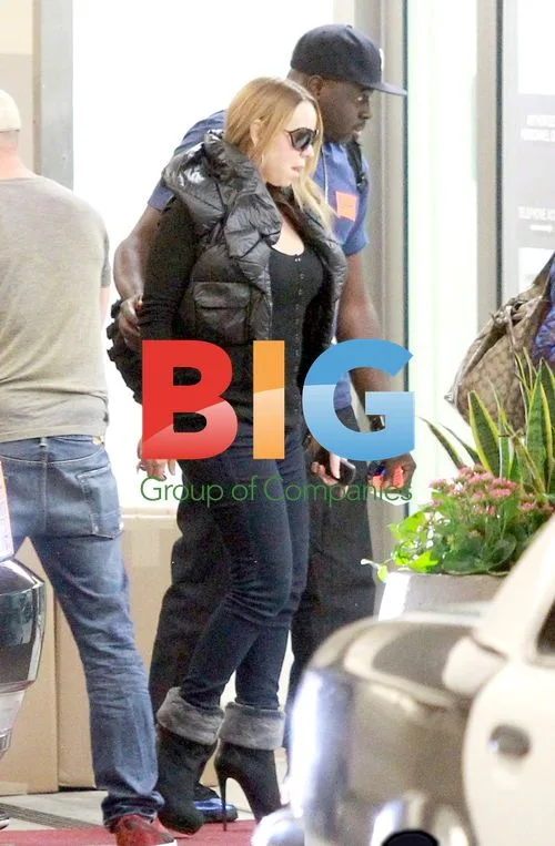 Nick Cannon and Mariah Carey Leave Aspen Hospital