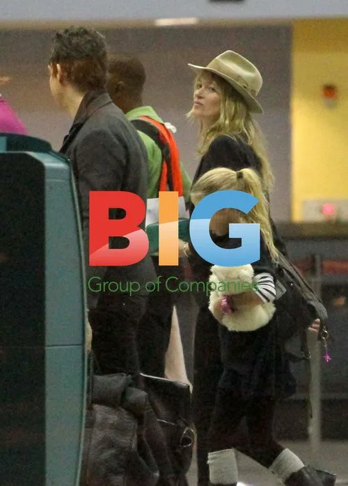 Kate Moss, Jamie Hince, and Lila Grace at Airport