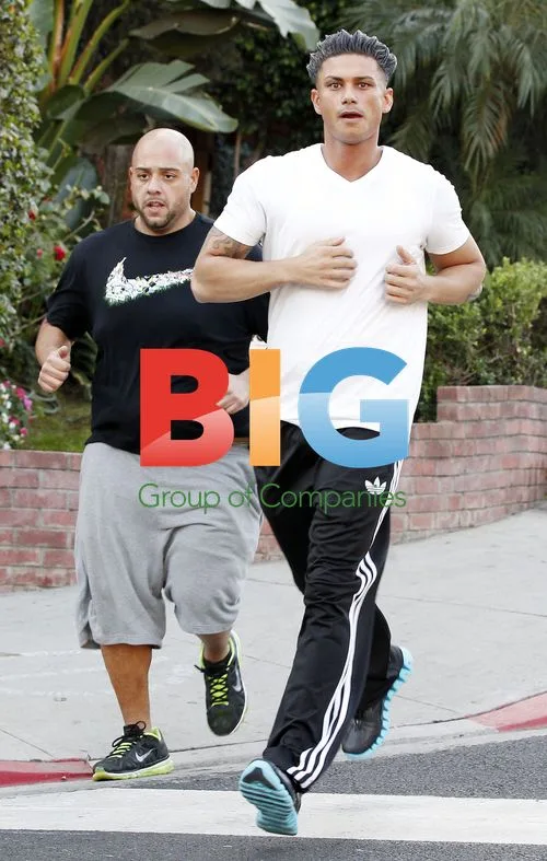 Pauly D Running with Friend in LA