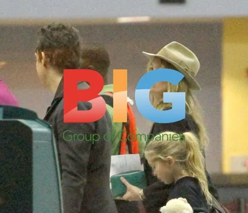 Kate Moss, Jamie Hince and Daughter at Airport