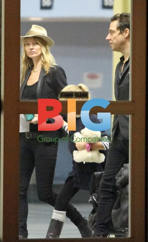 Kate Moss and Family Leave Caribbean Airport