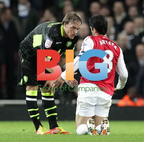 Arsenal's Mikel Arteta Fouled by Leeds United's Mika Vayrynen