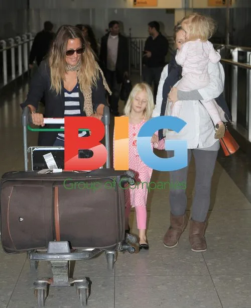 Caroline Flack Returns from India Trip