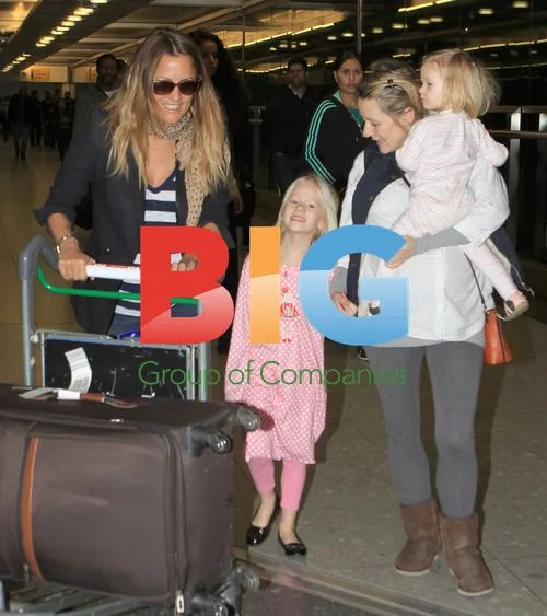 Caroline Flack Arrives from India Trip