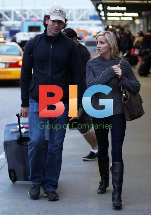 Camille Grammer at LAX with Boyfriend