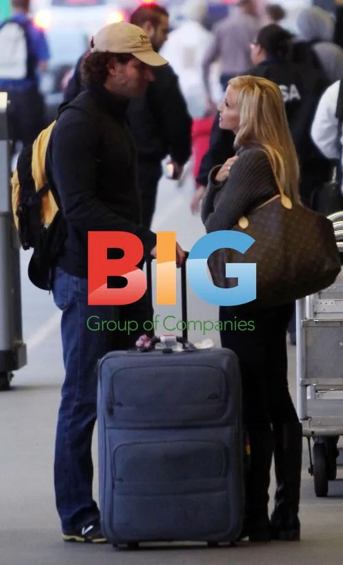 Camille Grammer at LAX with new boyfriend