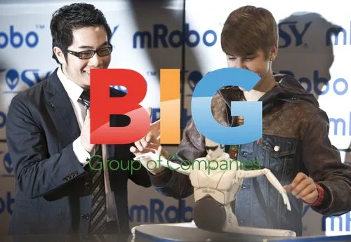 Justin Bieber plays with TOSY robot at 2012 CES