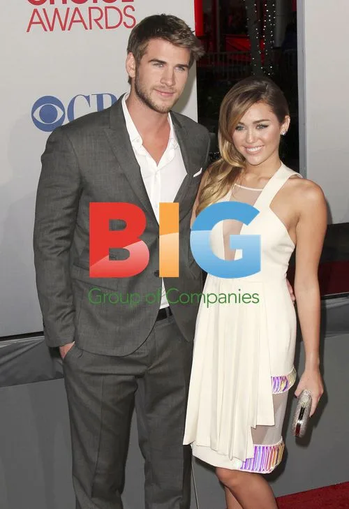 Miley Cyrus and Liam Hemsworth at the People's Choice Awards 2012
