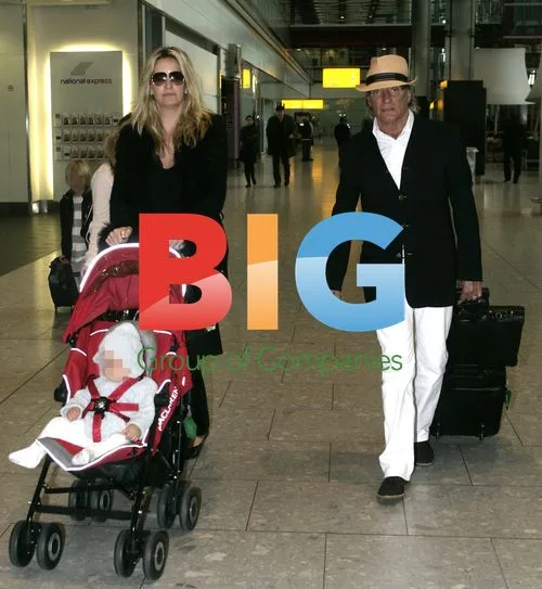 Rod Stewart and Family Arrive at Heathrow