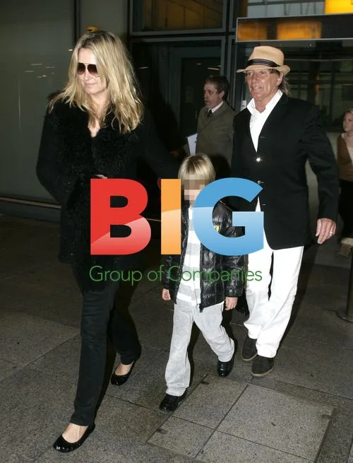 Rod Stewart and Family Arrive at Heathrow