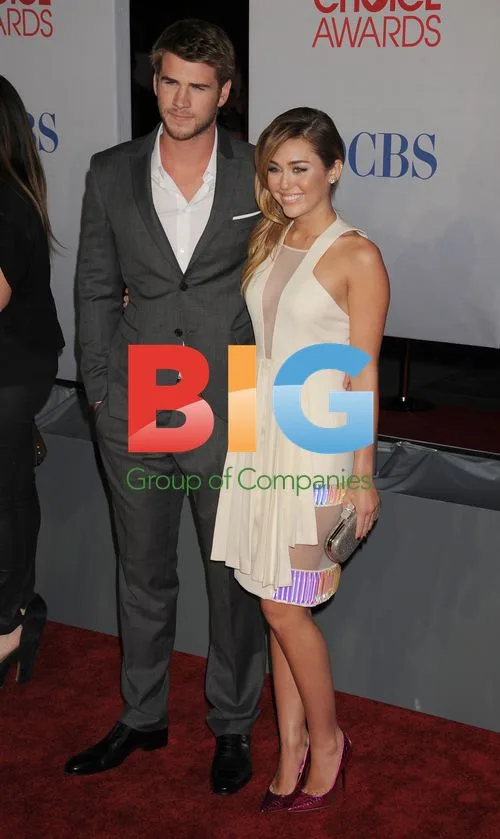 Liam Hemsworth and Miley Cyrus at People's Choice Awards 2012