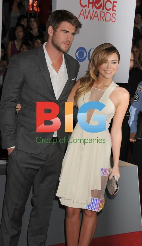 Liam Hemsworth and Miley Cyrus at People's Choice Awards 2012