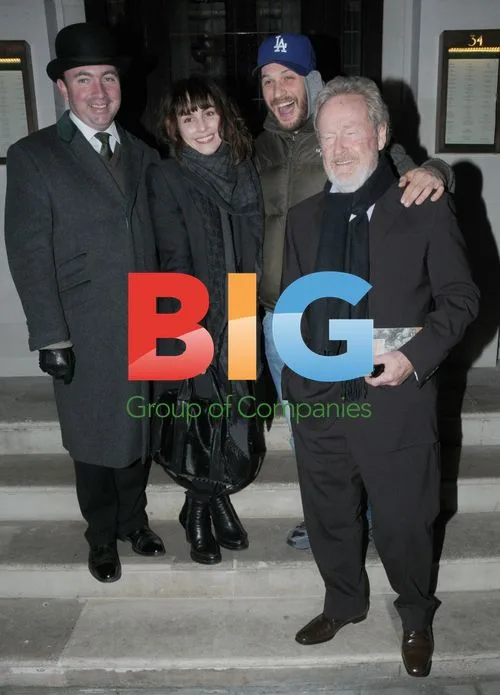 Tom Hardy, Noomi Rapace and Ridley Scott Smile