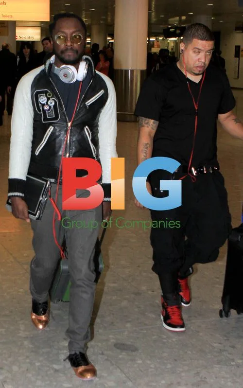 Will.i.Am Arrives at Heathrow Airport