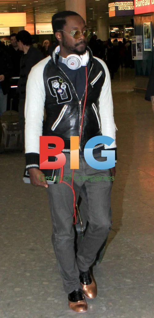 Will.i.Am Arrives at Heathrow Airport