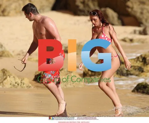 Amy Childs Relaxes in Polka Dot Bikini