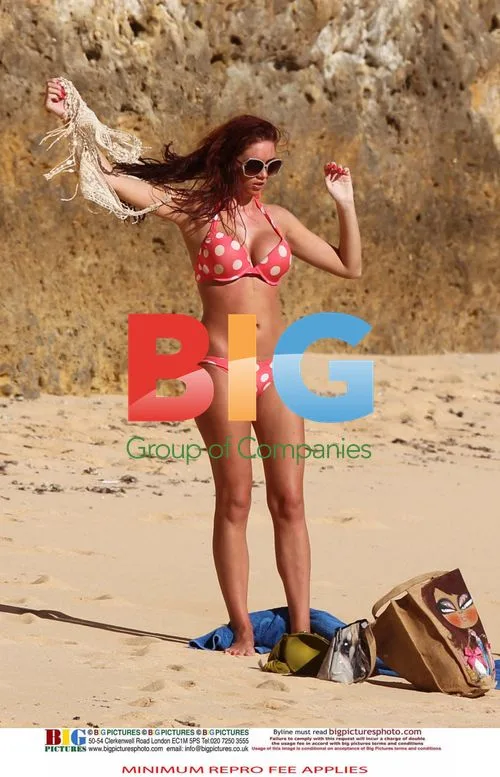Amy Childs Enjoys Sun in Polka Dot Bikini