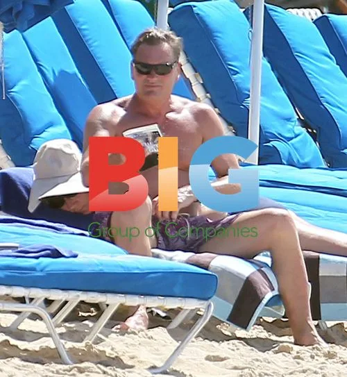 Glenn Hoddle and Wife Relax on Caribbean Beach