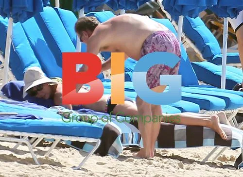 Glenn Hoddle on Caribbean beach with wife