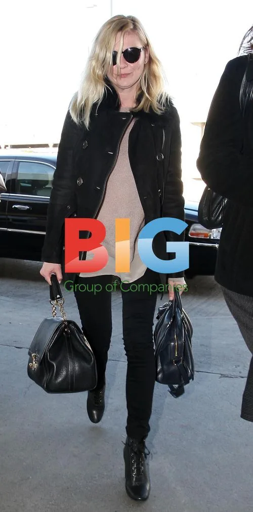 Kirsten Dunst Arrives at LAX