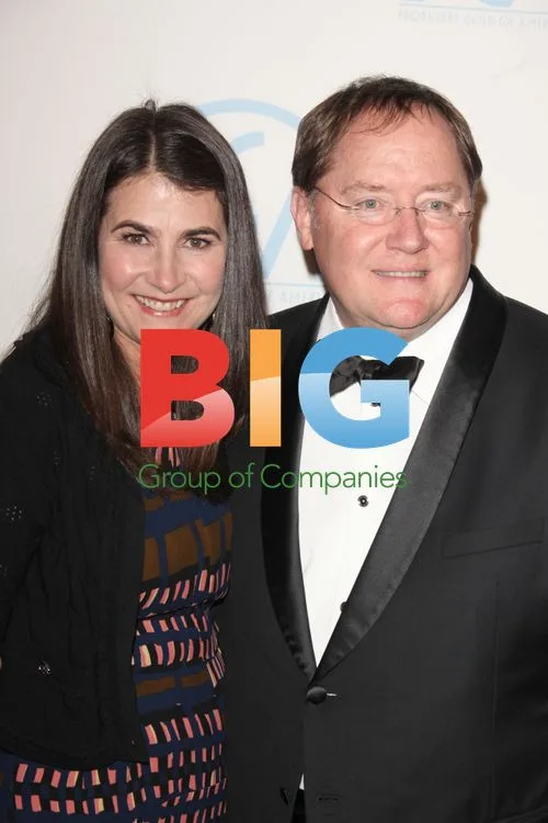 Denise Ream and John Lasseter at Producers Guild Awards