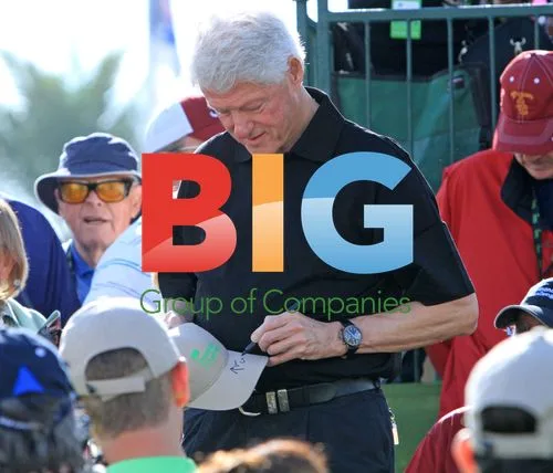 Bill Clinton signs autographs before Humana Challenge
