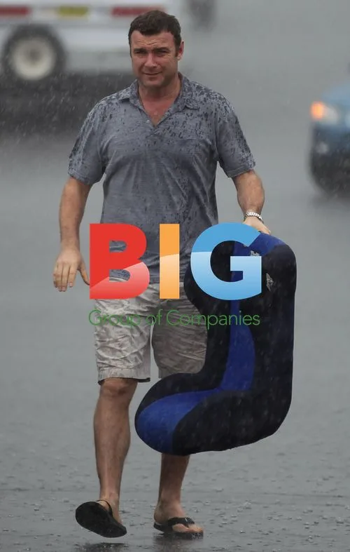Liev Shreiber and sons in the rain