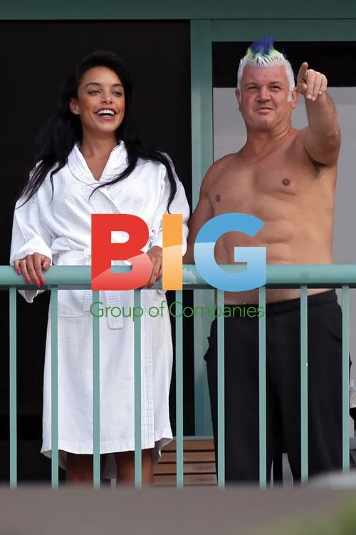 Darryn Lyons Shows Off Abs With Girlfriend