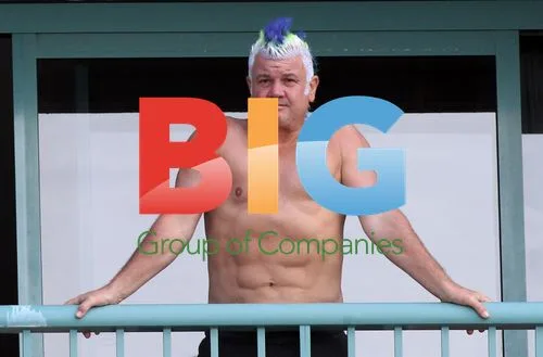 Darryn Lyons and Girlfriend on Hotel Balcony