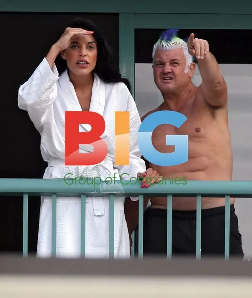 Darryn Lyons Shows Off Abs