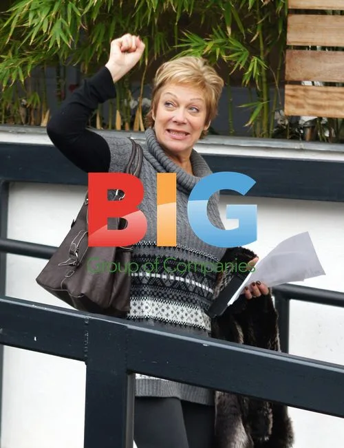 Denise Welch kisses Russell Grant