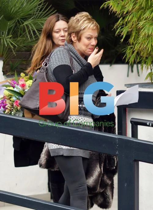 Denise Welch kisses Russell Grant