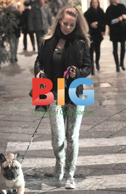 Helena Segar takes dog for walk in Milan