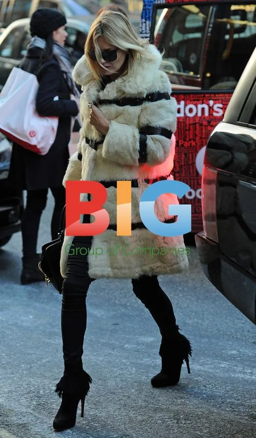 Kate Moss Leaves Lunch with Friends in London